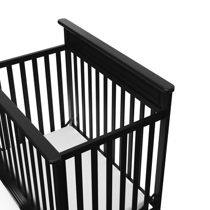 Storkcraft® Petal 4-in-1 Convertible Mini Crib with Bonus Water-Resistant Mattress
