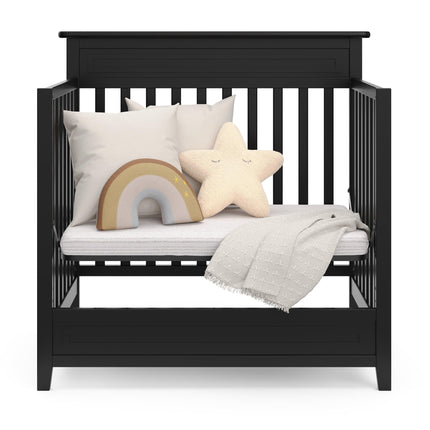 Storkcraft® Petal 4-in-1 Convertible Mini Crib with Bonus Water-Resistant Mattress