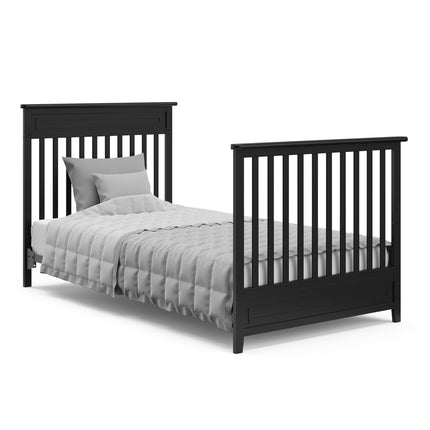 Storkcraft® Petal 4-in-1 Convertible Mini Crib with Bonus Water-Resistant Mattress