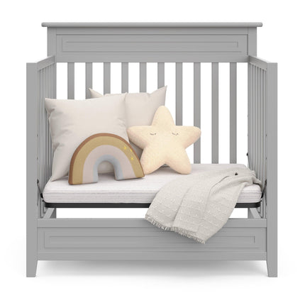 Storkcraft® Petal 4-in-1 Convertible Mini Crib with Bonus Water-Resistant Mattress