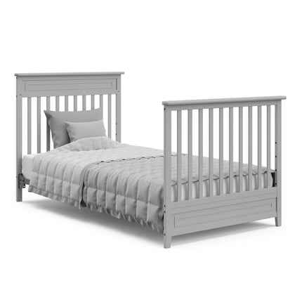Storkcraft® Petal 4-in-1 Convertible Mini Crib with Bonus Water-Resistant Mattress