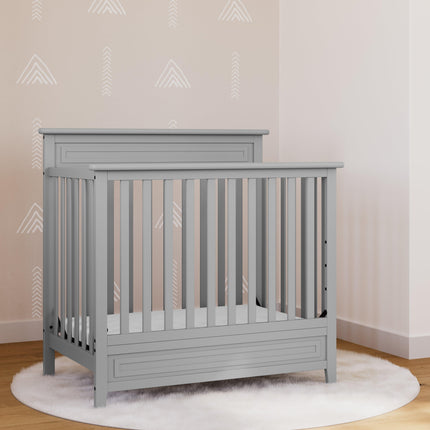 Storkcraft® Petal 4-in-1 Convertible Mini Crib with Bonus Water-Resistant Mattress