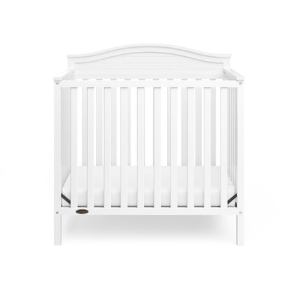 Graco® Stella 4-in-1 Convertible Mini Crib with Bonus Water-Resistant Mattress