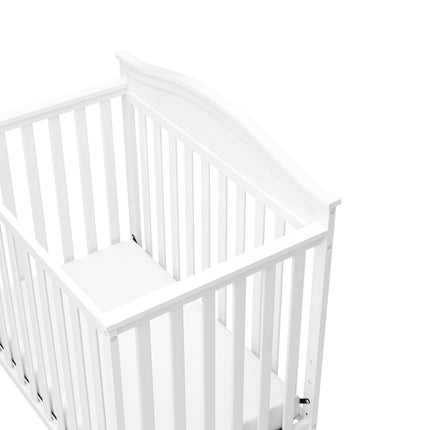 Graco® Stella 4-in-1 Convertible Mini Crib with Bonus Water-Resistant Mattress