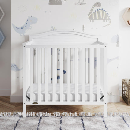 Graco® Stella 4-in-1 Convertible Mini Crib with Bonus Water-Resistant Mattress