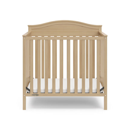 Graco® Stella 4-in-1 Convertible Mini Crib with Bonus Water-Resistant Mattress