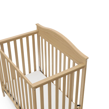 Graco® Stella 4-in-1 Convertible Mini Crib with Bonus Water-Resistant Mattress