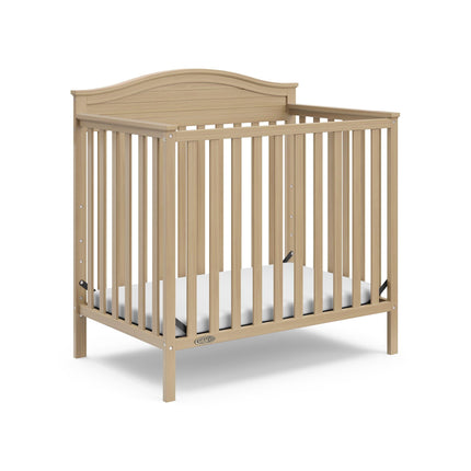 Graco® Stella 4-in-1 Convertible Mini Crib with Bonus Water-Resistant Mattress