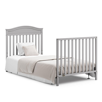 Graco® Stella 4-in-1 Convertible Mini Crib with Bonus Water-Resistant Mattress