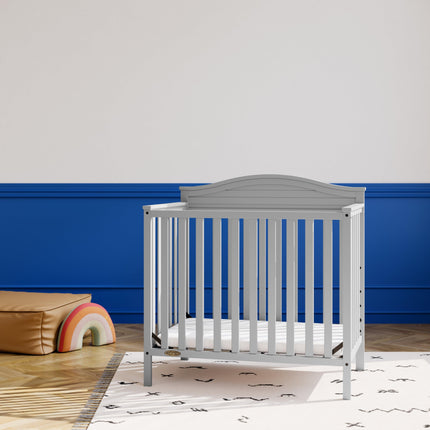 Graco® Stella 4-in-1 Convertible Mini Crib with Bonus Water-Resistant Mattress