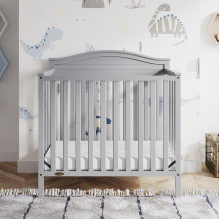 Graco® Stella 4-in-1 Convertible Mini Crib with Bonus Water-Resistant Mattress