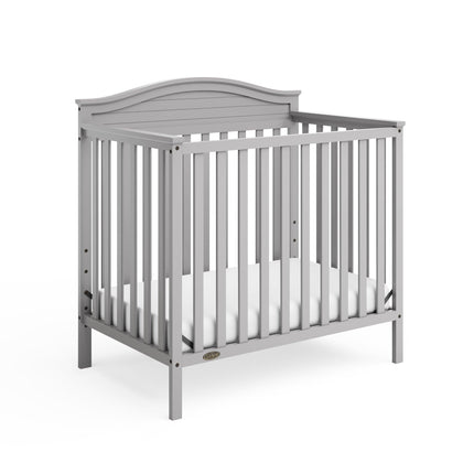Graco® Stella 4-in-1 Convertible Mini Crib with Bonus Water-Resistant Mattress