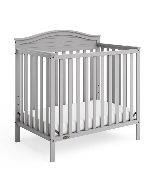 Graco® Stella 4-in-1 Convertible Mini Crib with Bonus Water-Resistant Mattress