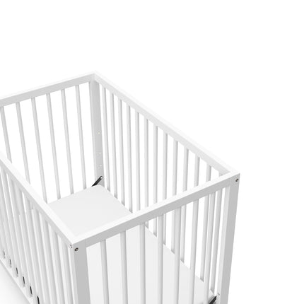 Graco® Teddi® 4-in-1 Convertible Mini Crib with Bonus Water-Resistant Mattress