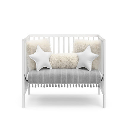 Graco® Teddi® 4-in-1 Convertible Mini Crib with Bonus Water-Resistant Mattress