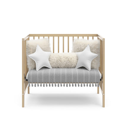 Graco® Teddi® 4-in-1 Convertible Mini Crib with Bonus Water-Resistant Mattress