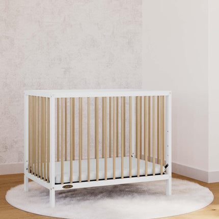 Graco® Teddi® 4-in-1 Convertible Mini Crib with Bonus Water-Resistant Mattress