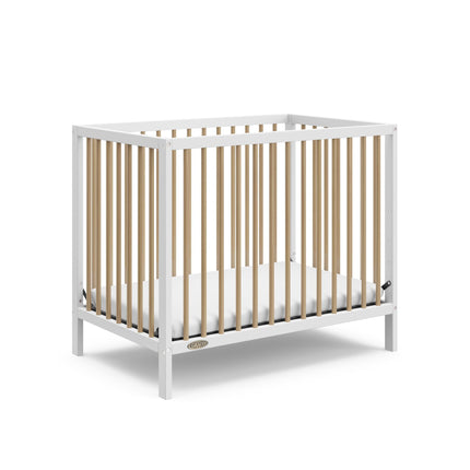 Graco® Teddi® 4-in-1 Convertible Mini Crib with Bonus Water-Resistant Mattress