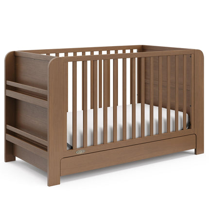 Graco® Read-with-Me® 4-in-1 Convertible Bookshelf Crib with Drawer