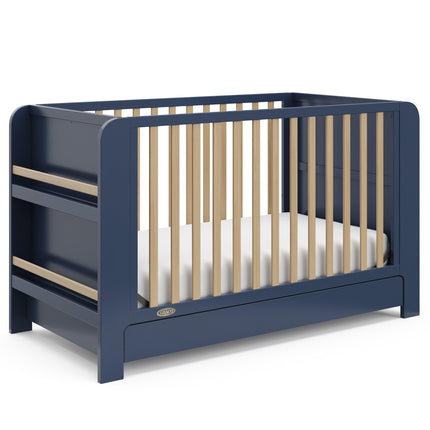 Graco® Read-with-Me® 4-in-1 Convertible Bookshelf Crib with Drawer